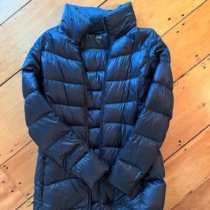 Uni qlo black puffy jacket.